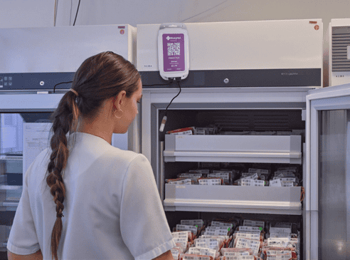 Temperature monitoring display with fridges and freezers under automated surveillance